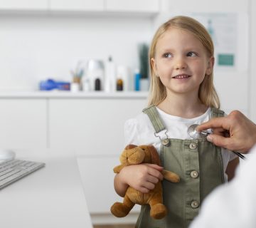 Young girl pediatrician consultation with her doctor 360x320